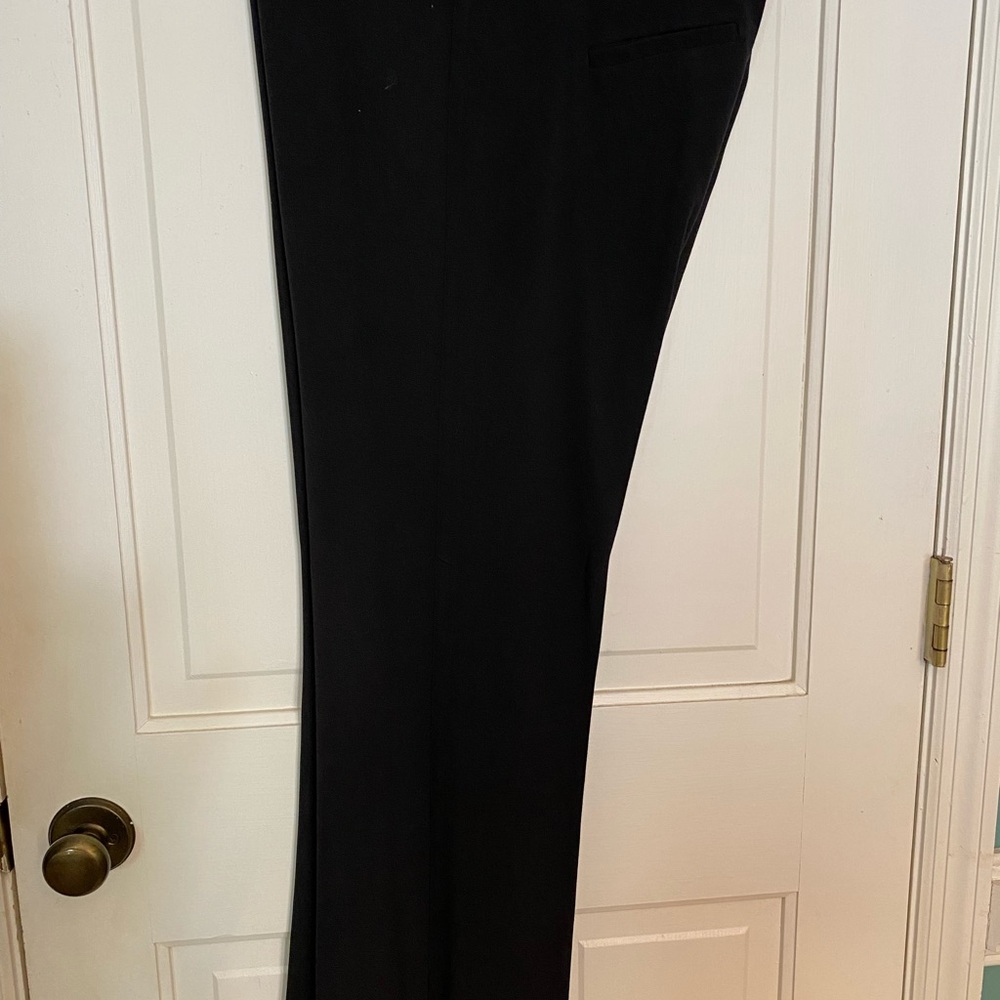 Black Kenneth Cole Pants. Wide Waist Band. 3 Hook Closure. 2 Back Pockets.